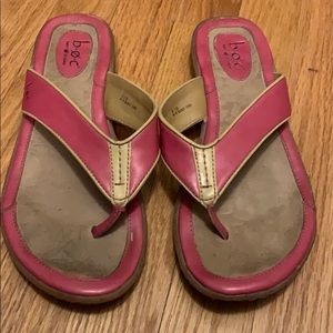 Pink leather flip flops